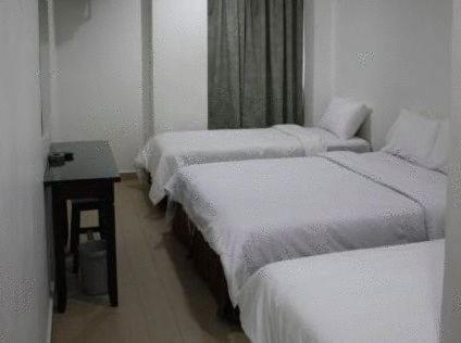 Dynasty Inn - Wakaf Che Yeh Zimmer foto